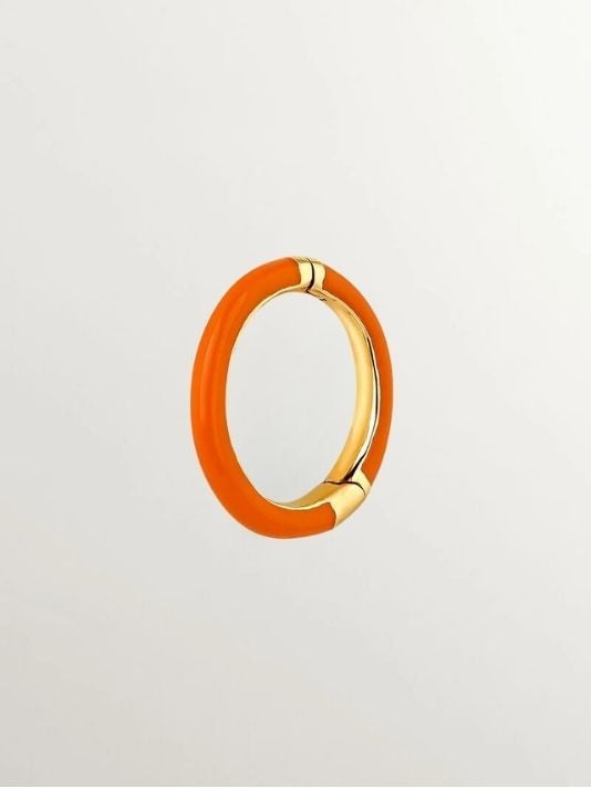 Individual medium hoop earring made of 9K yellow gold with orange enamel.